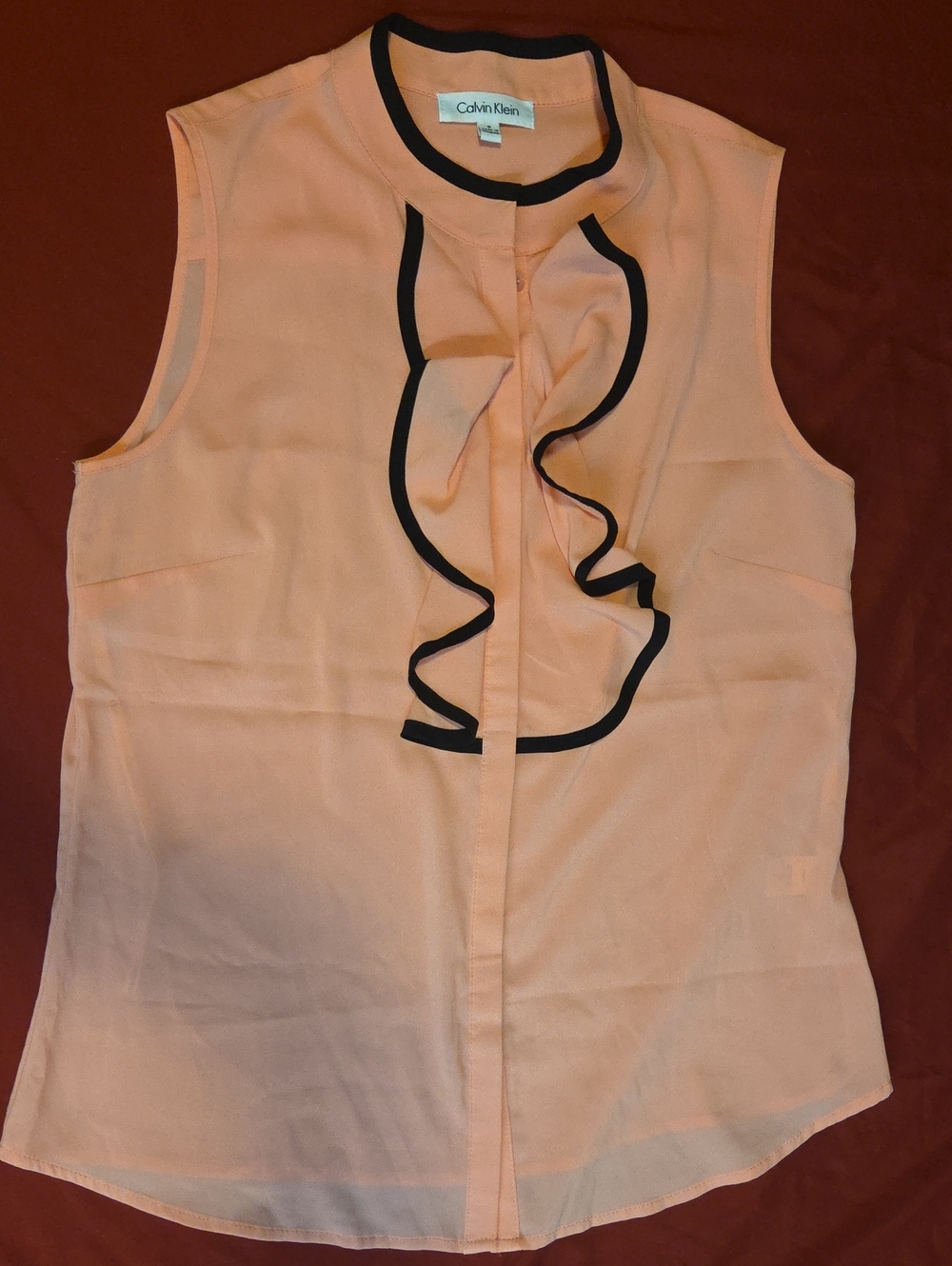 Calvin Klein Peach Sleeveless Ruffle Trim Camisole with Black Piping.        *